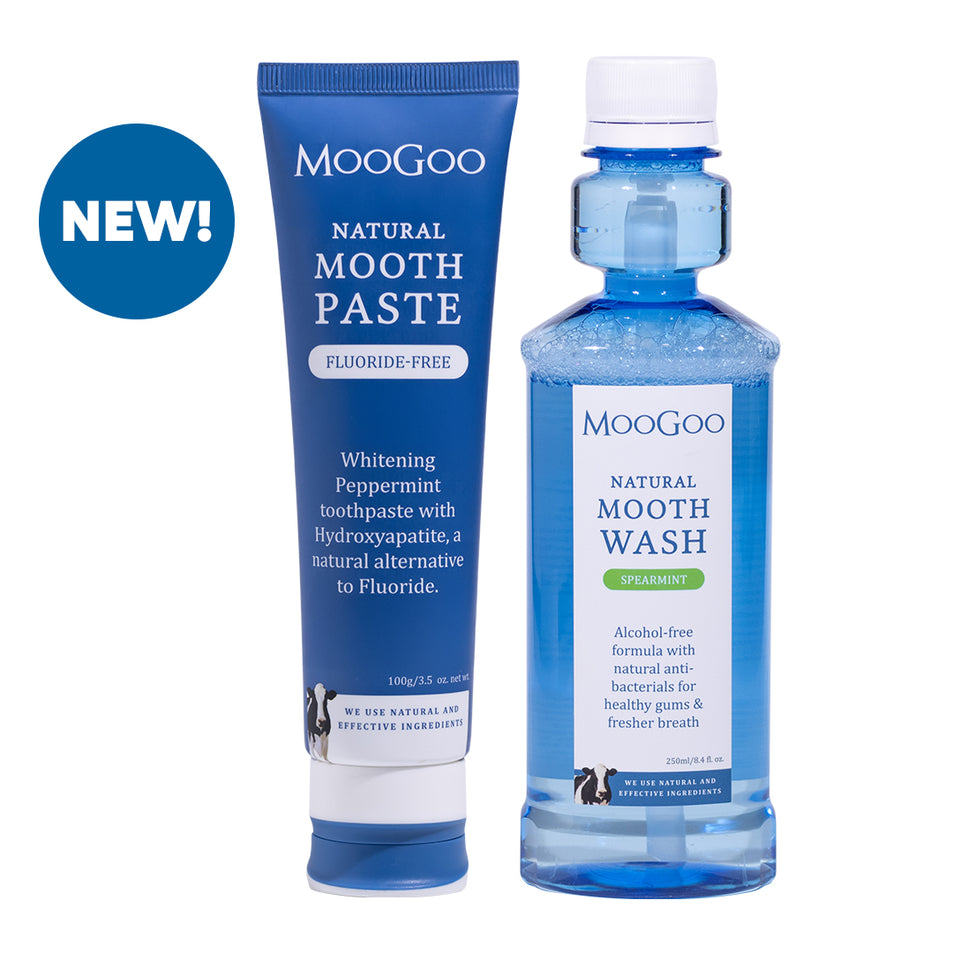 MooGoo Natural Moothpaste and MooGoo Natural Moothwash standing side by side on white background, fluoride-free toothpaste, alcohol-free mouthwash, natural dental care