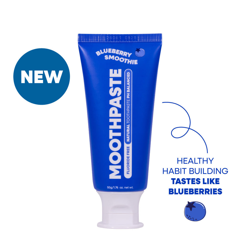 Tube of MooGoo Kids Blueberry flavoured toothpaste on a white background. Healthy habit building, tastes like blueberries. Fluoride-free formula, safe for kids.