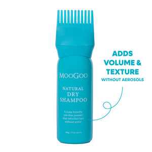 A turquoise blue bottle of MooGoo Natural Dry Shampoo with a matching wide-tooth comb applicator on top, shown on a white background. Adds volume and texture without aerosols. 