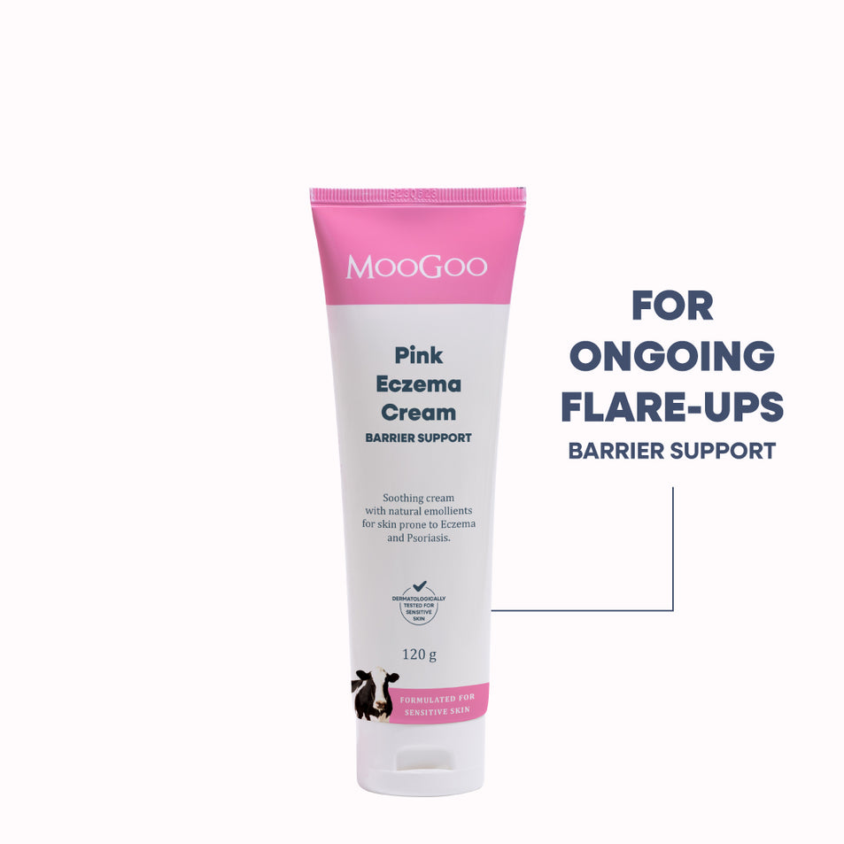 MooGoo Pink Eczema Cream in a 120g squeeze tube, featuring a white body with a bright pink cap and pink accents on the label. With B12 for ongoing eczema flare ups. 