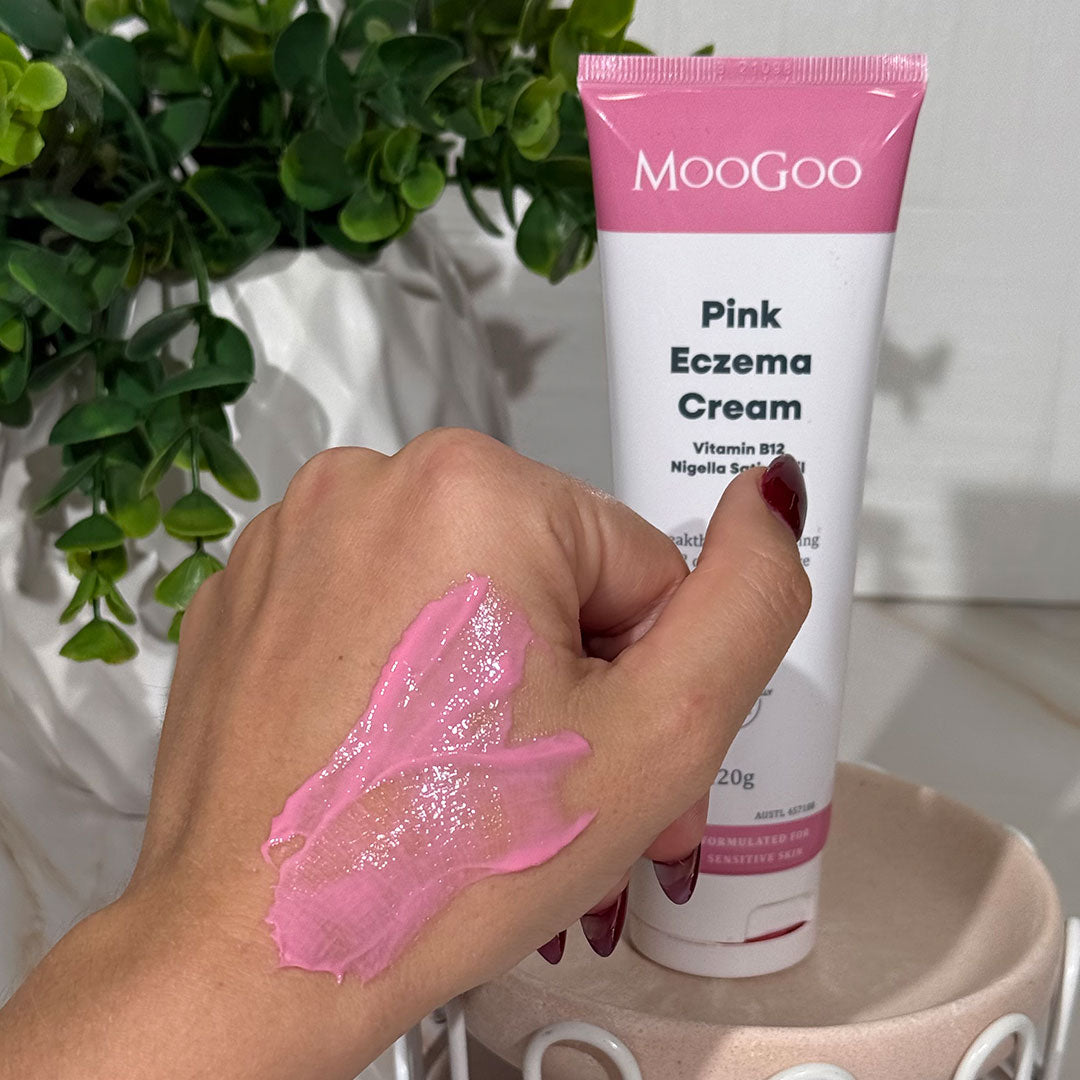 MooGoo Pink Eczema Cream swatch on hand, lightweight Vitamin B12 treatment moisturiser for eczema, psoriasis and dermatitis relief.